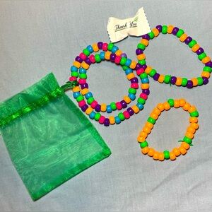 Assorted color bead bracelets for kids. Sold together.